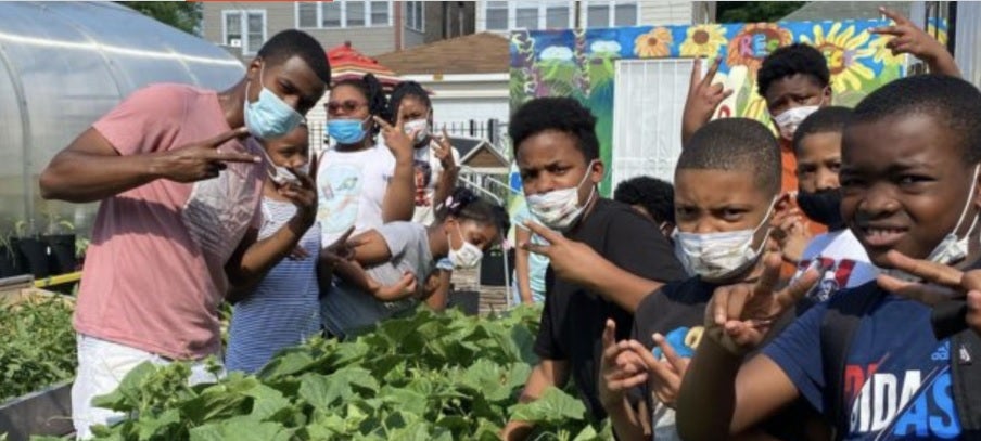 Youth group photo at a garden