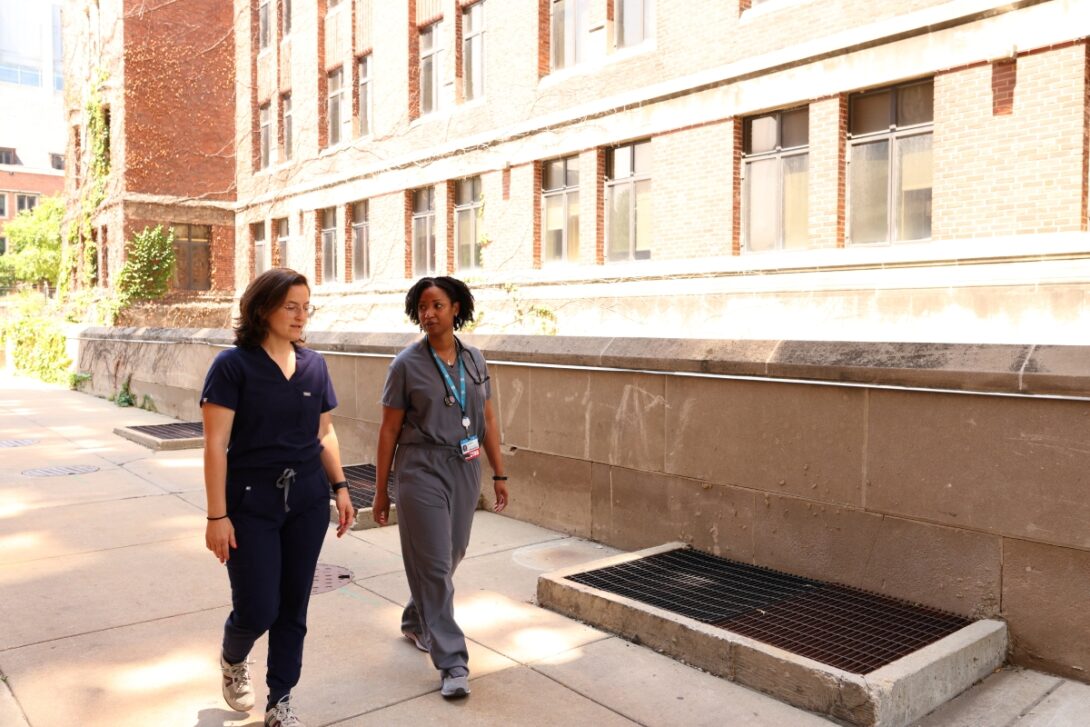 Dr. Sarah Messmer (left) and Dr. Lauren Williams meet on the UIC campus to discuss their work. (Photo: Jenny Fontaine/University of Illinois Chicago)