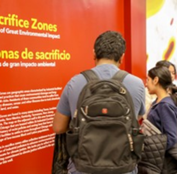 Students at the grand opening learn about Chicago’s sacrifice zones. 