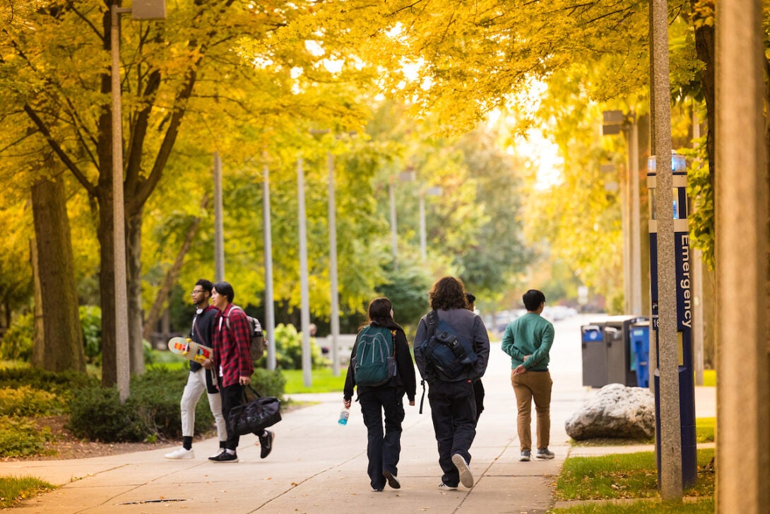 Campus scenery of students walking.