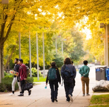 Campus scenery of students walking. 