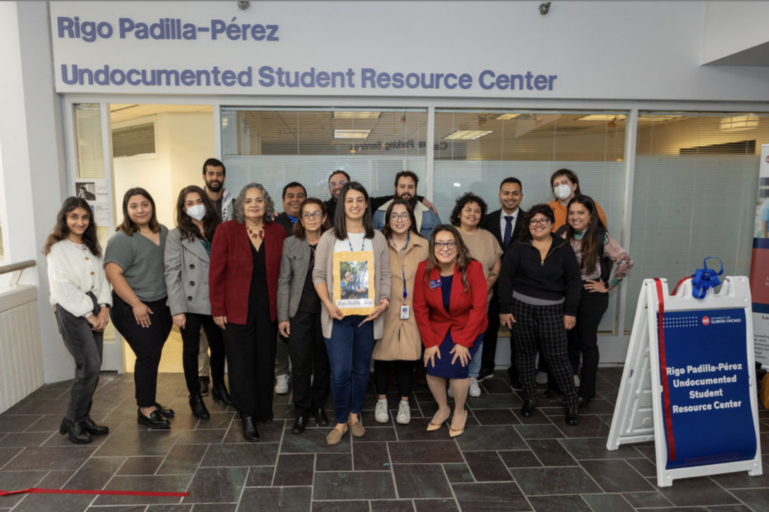 A group of UIC staff and students at the ribbon-cutting ceremony for the center.