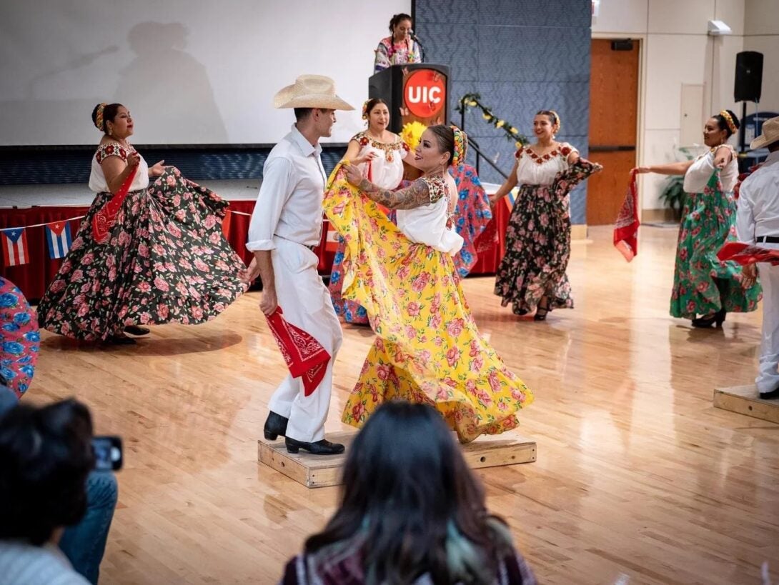 A couple dances at the closing event of UIC’s 2022 celebration of Hispanic Heritage Month.