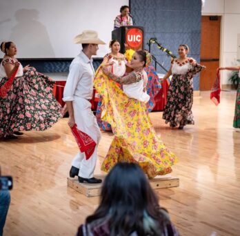 A couple dances at the closing event of UIC’s 2022 celebration of Hispanic Heritage Month. 